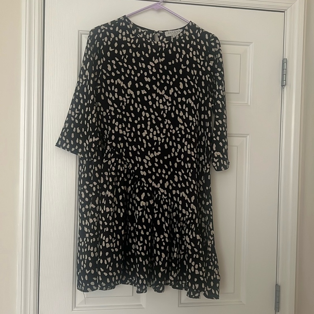 Hayden Dress. Asymmetrical seam going down the bottom 1/3 of the dress